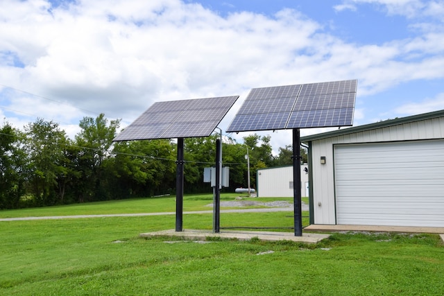 view of yard with an outbuilding and a garage