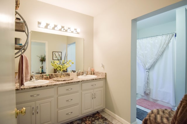 bathroom with vanity and tile patterned floors