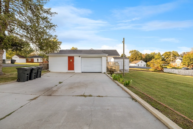 garage with a lawn