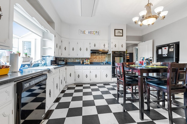 kitchen with black appliances, under cabinet range hood, dark countertops, beverage cooler, and tile patterned floors