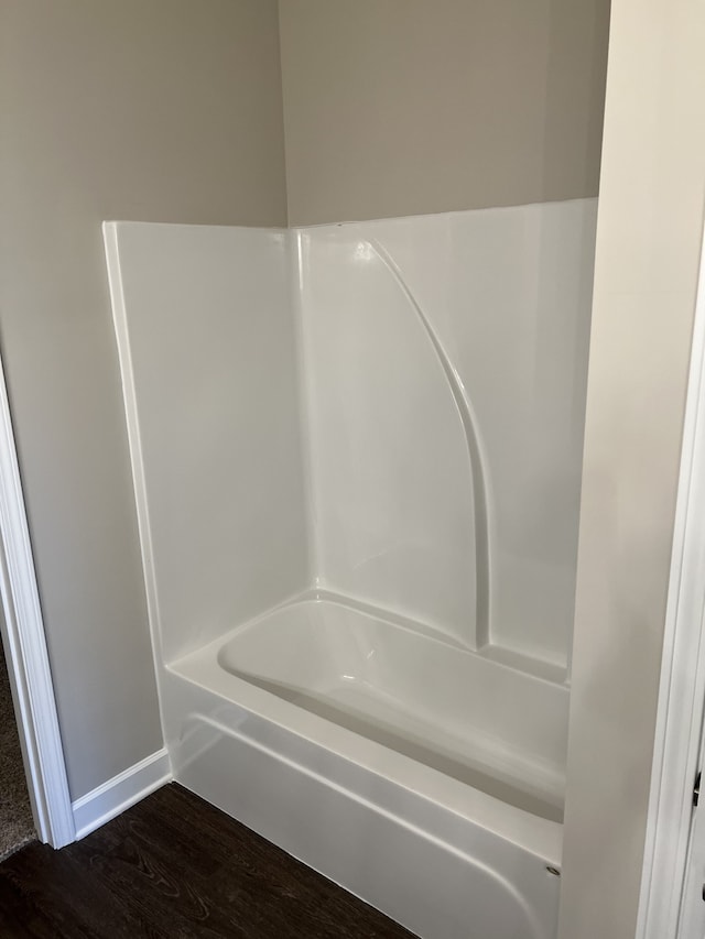 bathroom with wood-type flooring