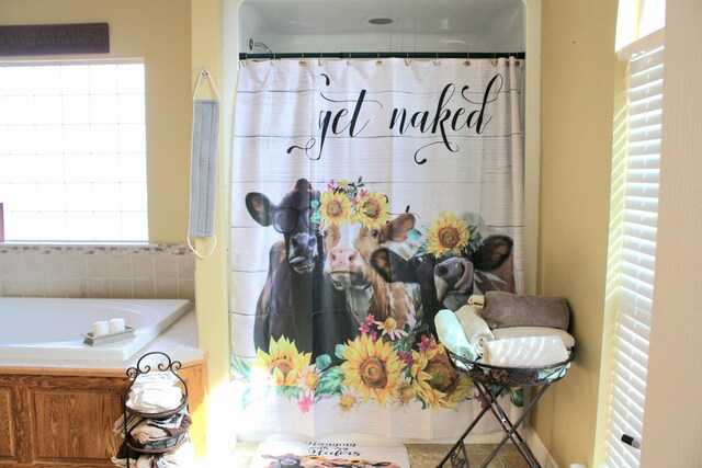 bathroom featuring a tub