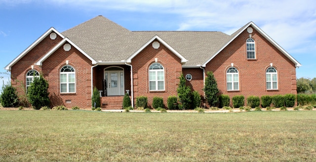 view of front facade featuring a front yard