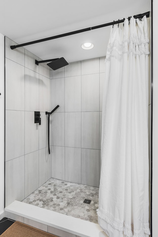 bathroom with curtained shower