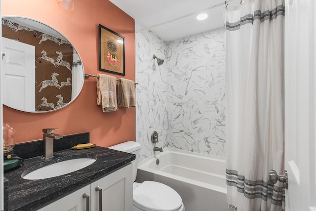 full bathroom featuring shower / bathtub combination with curtain, vanity, and toilet