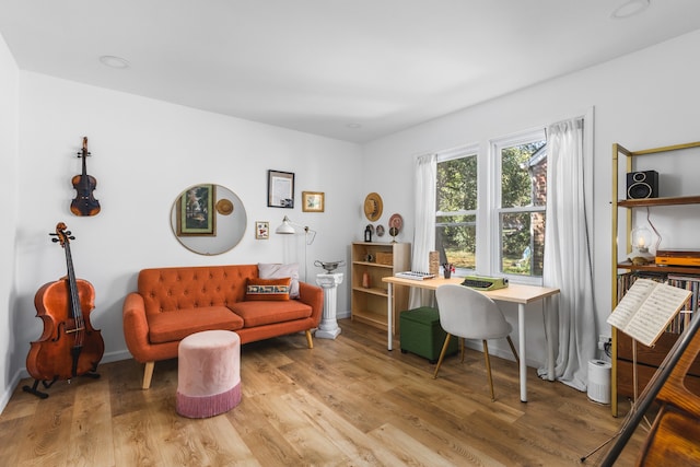 office area with hardwood / wood-style floors