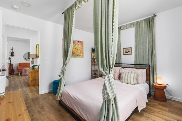 bedroom featuring hardwood / wood-style floors