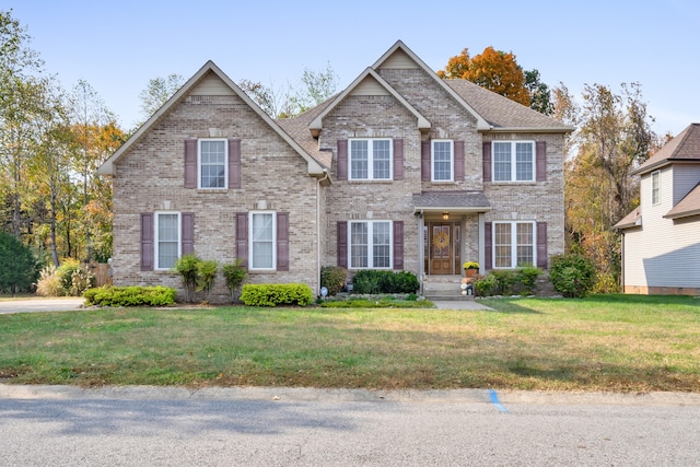 view of front of house with a front lawn