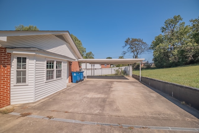 view of patio / terrace featuring a carport