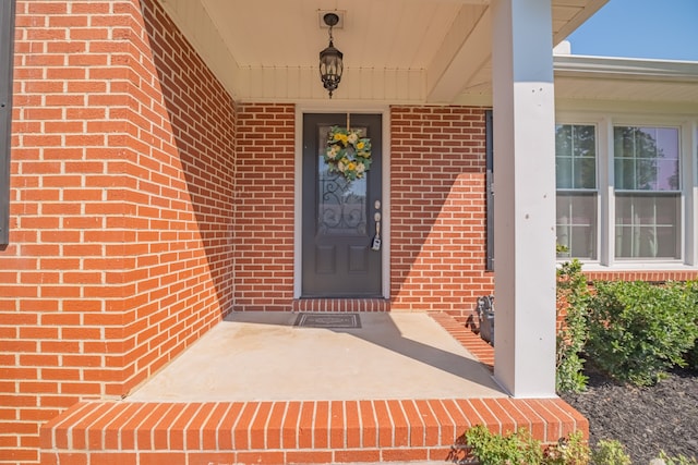 doorway to property featuring a porch