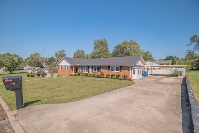 ranch-style house featuring a front yard