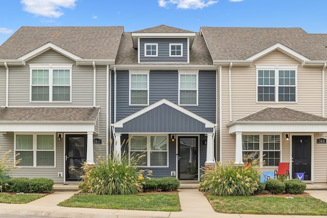 multi unit property featuring a porch