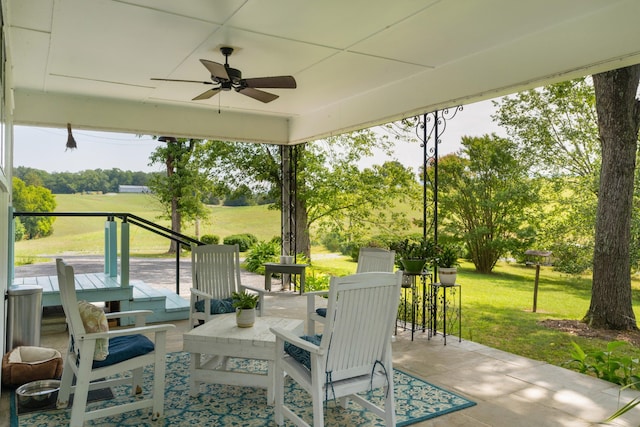 view of patio / terrace with a rural view and ceiling fan