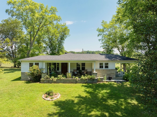 single story home with a front lawn and a patio