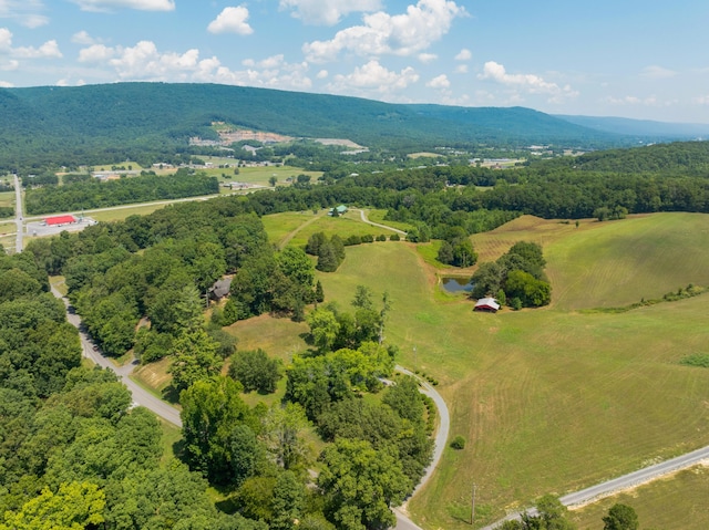 bird's eye view with a mountain view and a rural view