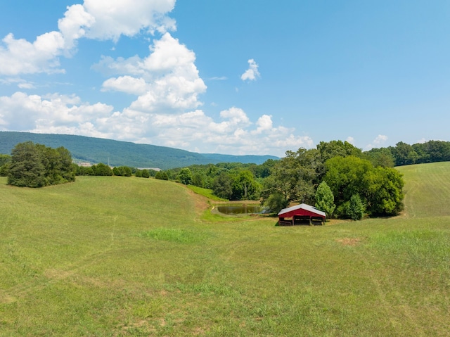 view of mountain feature featuring a rural view