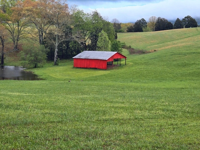 919 John Burch Rd, Dunlap, TN 37327 - view of yard with an outbuilding and a rural view