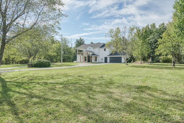 view of yard featuring a garage