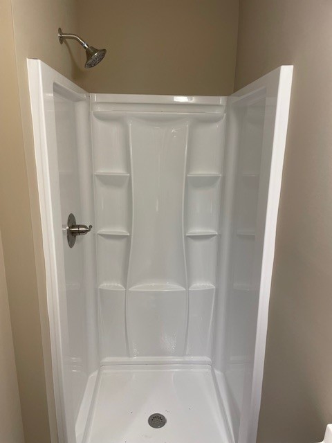 bathroom with a shower