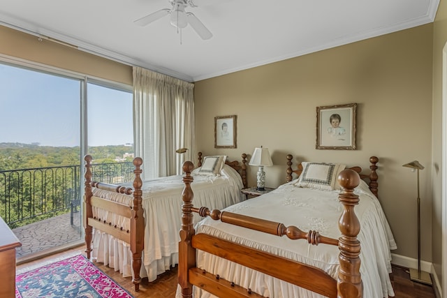 bedroom featuring multiple windows, access to outside, crown molding, and ceiling fan