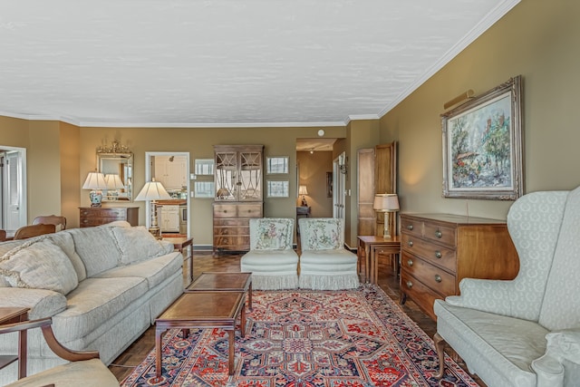 living room featuring hardwood / wood-style flooring and ornamental molding