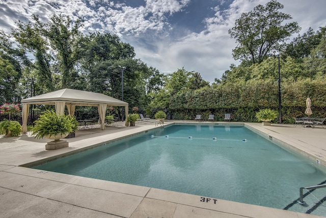 view of pool with a gazebo and a patio area