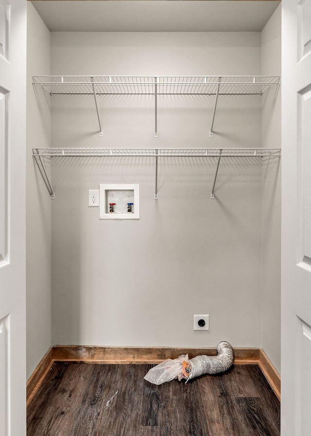 clothes washing area with washer hookup, hookup for an electric dryer, and dark hardwood / wood-style flooring