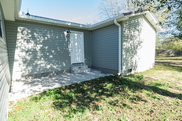 exterior space with a yard