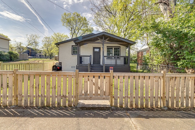 bungalow-style home featuring covered porch