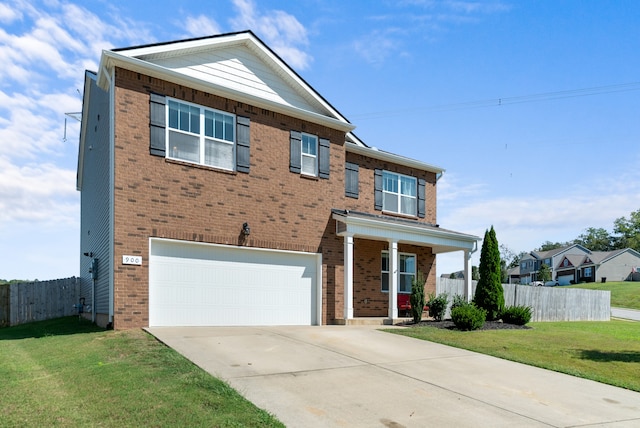 view of front facade featuring a garage and a front lawn