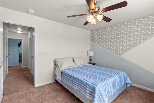 bedroom featuring ceiling fan and light carpet