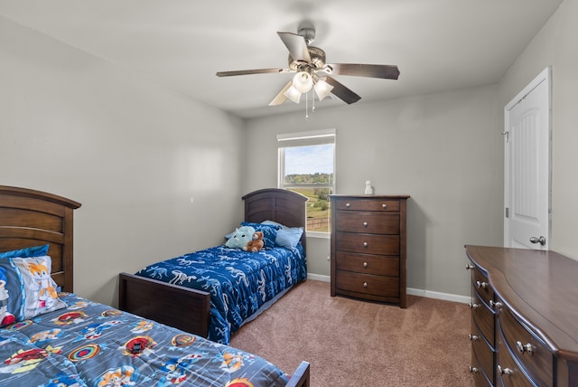 carpeted bedroom with ceiling fan