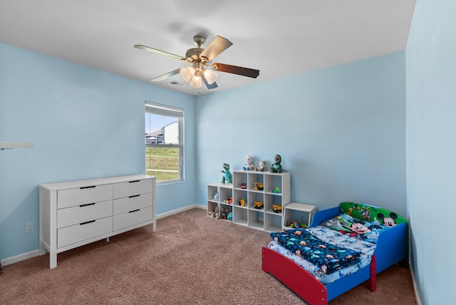 carpeted bedroom featuring ceiling fan