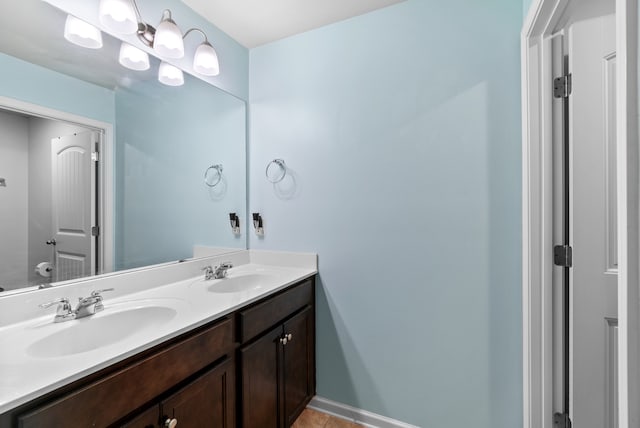 bathroom with vanity and tile patterned flooring