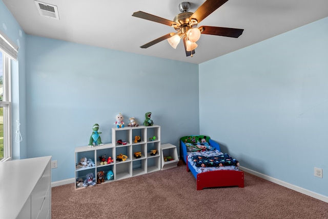 interior space featuring ceiling fan