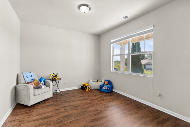 unfurnished room featuring dark wood-type flooring