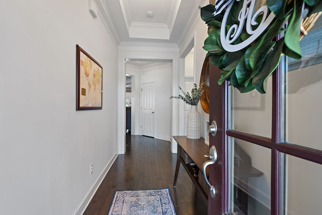 hall with ornamental molding and dark hardwood / wood-style floors