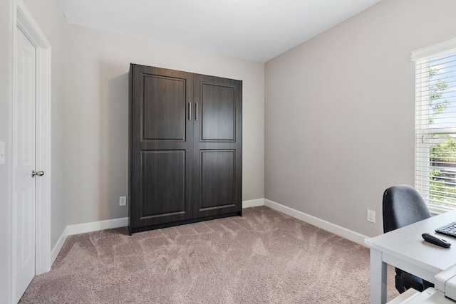 unfurnished office with light carpet and a healthy amount of sunlight