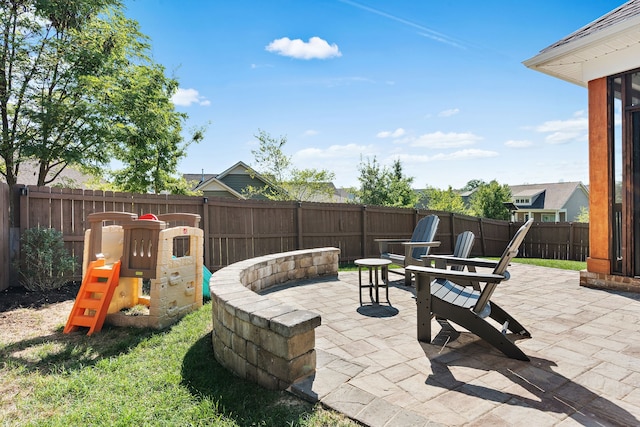 view of patio with a playground