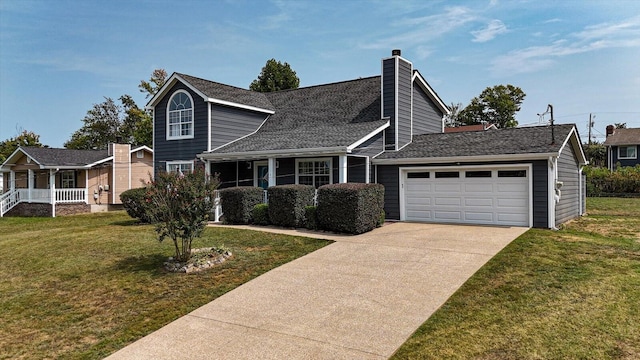 view of property featuring a front yard, a porch, and a garage