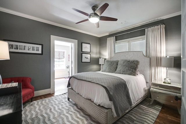 bedroom with ceiling fan, ensuite bathroom, crown molding, and hardwood / wood-style floors