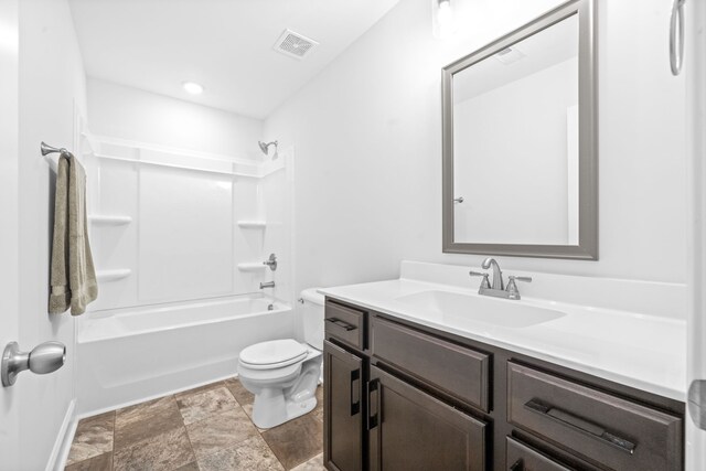 full bathroom featuring shower / washtub combination, vanity, and toilet