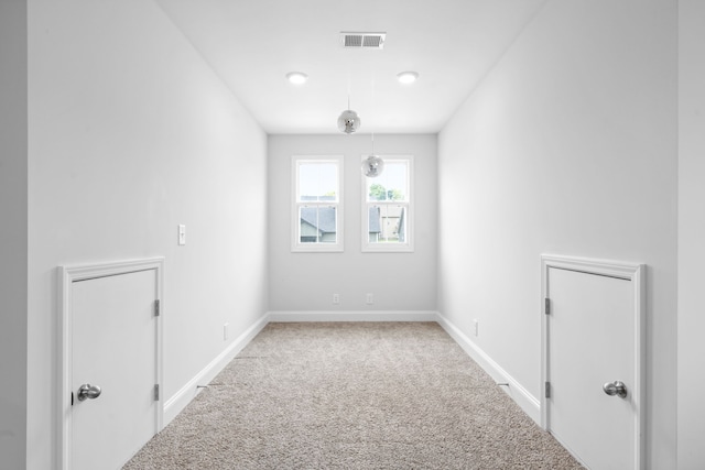 empty room featuring carpet