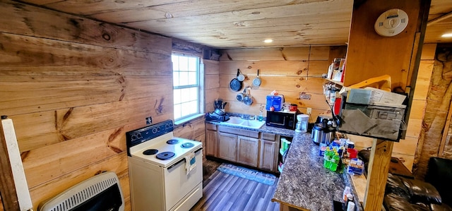 kitchen featuring wooden walls, wooden ceiling, dark stone countertops, dark hardwood / wood-style floors, and white range with electric cooktop