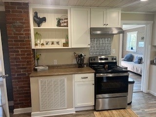 kitchen with white cabinetry, light wood-type flooring, crown molding, wooden ceiling, and stainless steel electric range oven