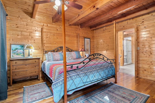 bedroom with wooden ceiling, beamed ceiling, hardwood / wood-style floors, and ceiling fan