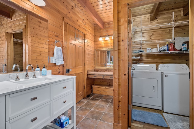 bathroom with beamed ceiling, wood ceiling, and wood walls