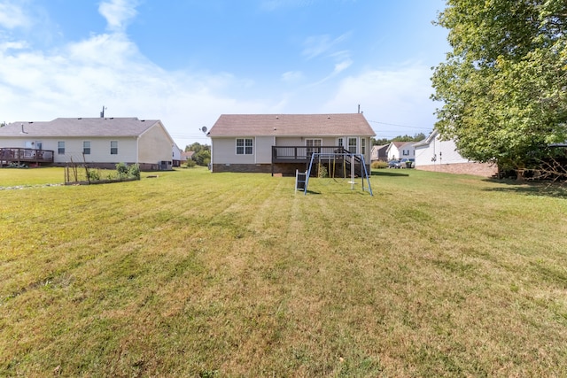 view of yard with a wooden deck