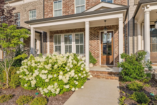 entrance to property with a porch