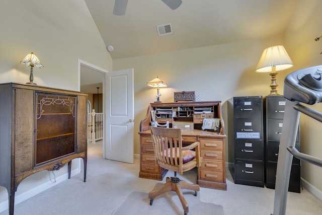 office area featuring light carpet, vaulted ceiling, and ceiling fan